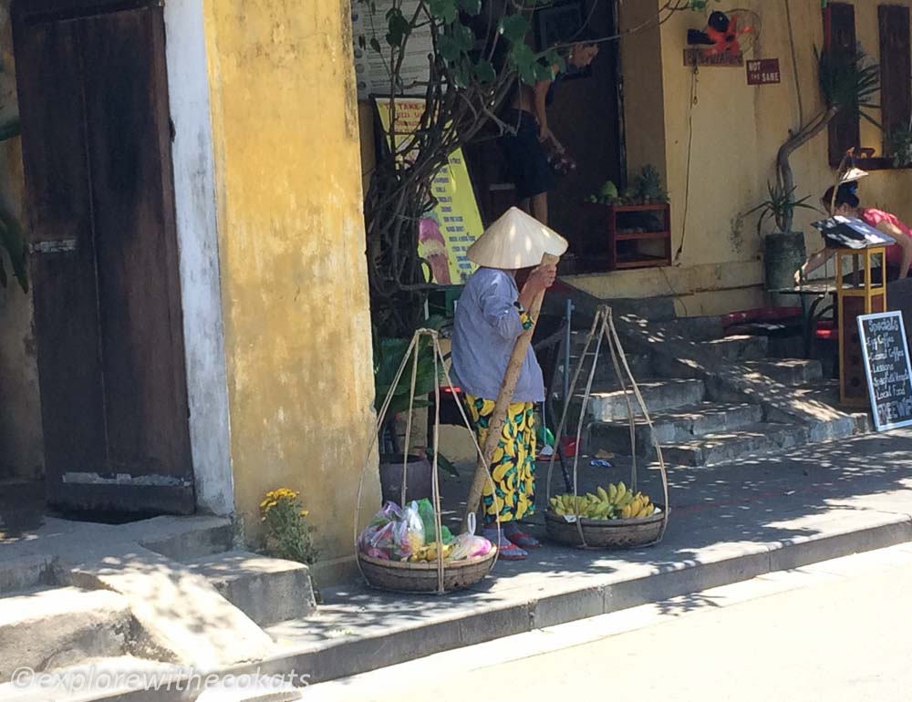 A local lady in banana printed pants