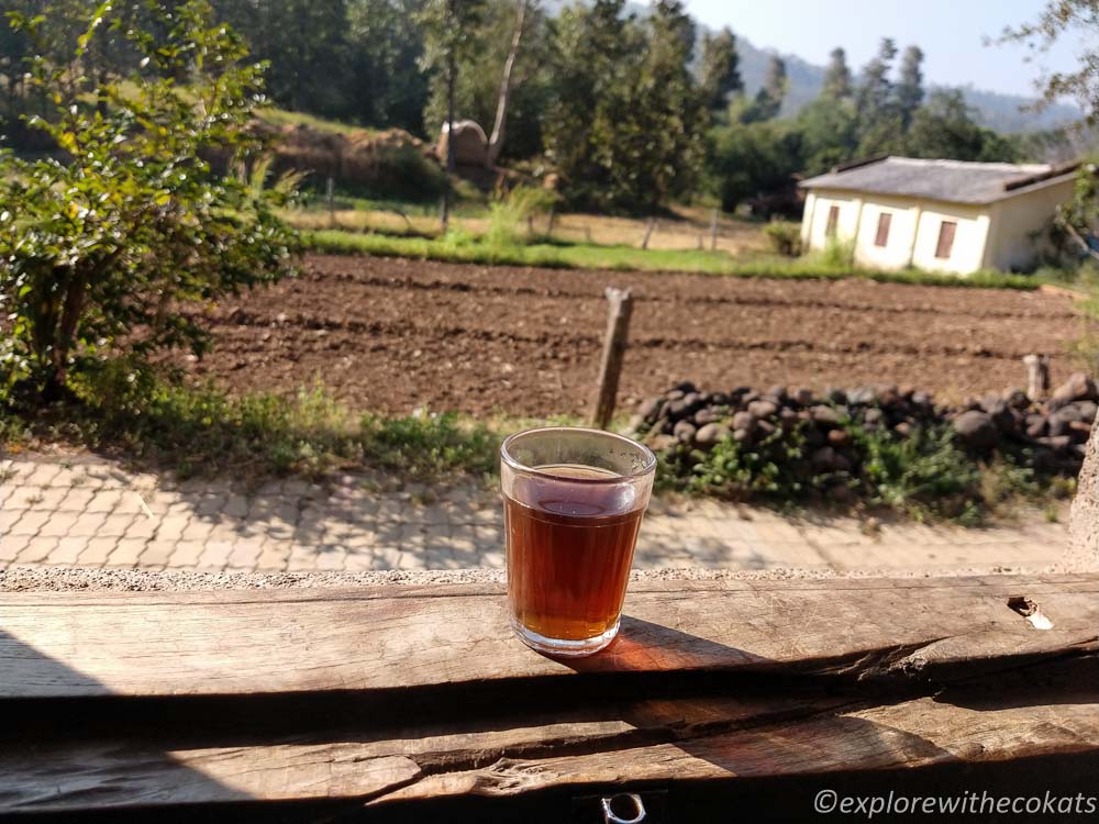 Fresh lemongrass tea overlooking the village