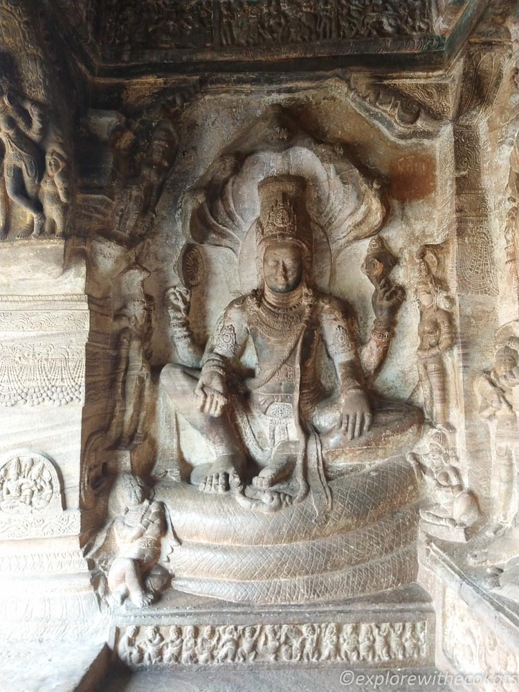 Bhagwan Vishnu seated on a coiled cosmic serpent, Adisesha