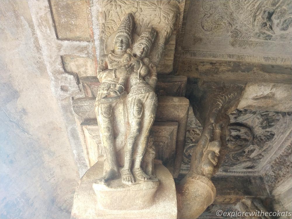 Angled brackets with embracing poses at Badami