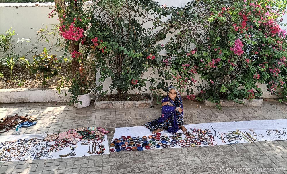 A local woman selling jewellery at Rann Riders Dasada